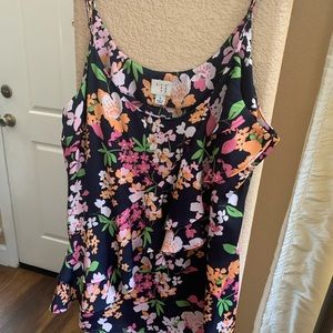 A new day multicolor top. Size large.  Blue orange pink and white